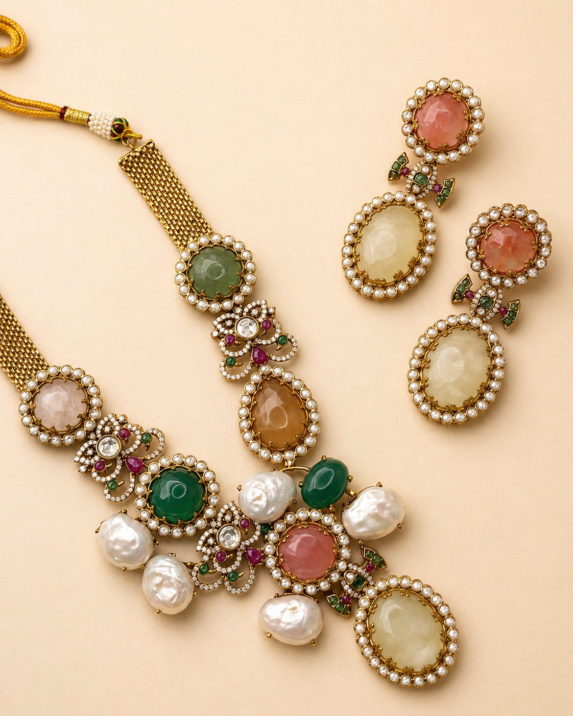 Jewelry set with necklace and earrings on a beige background
